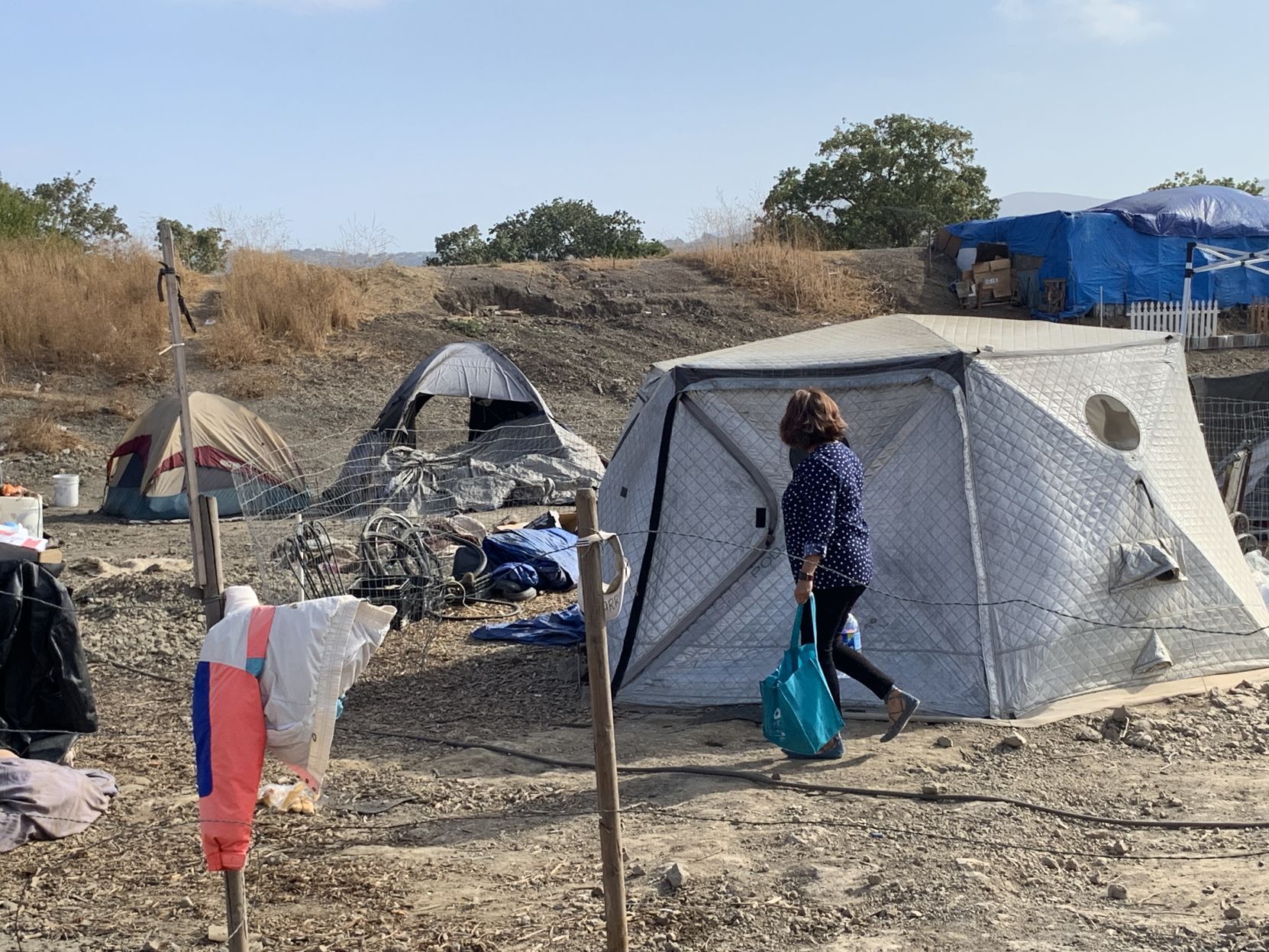 OLE Health distributes care bags to residents of the Bowl